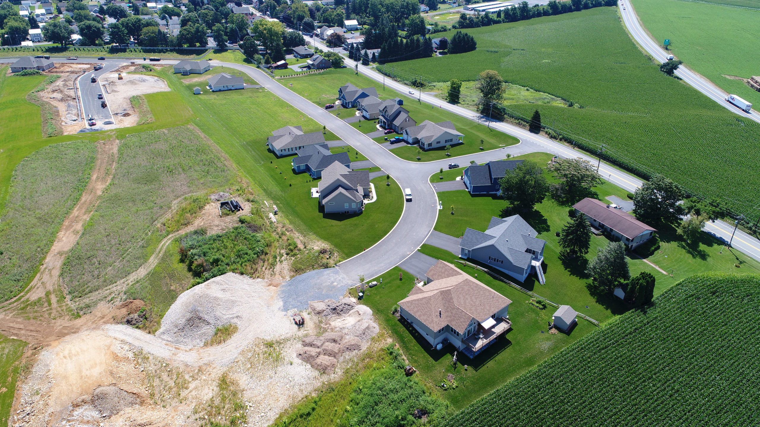 Aerial photo of Scenic Ridge at Cornwall showing roads, houses, surrounding fields and trees